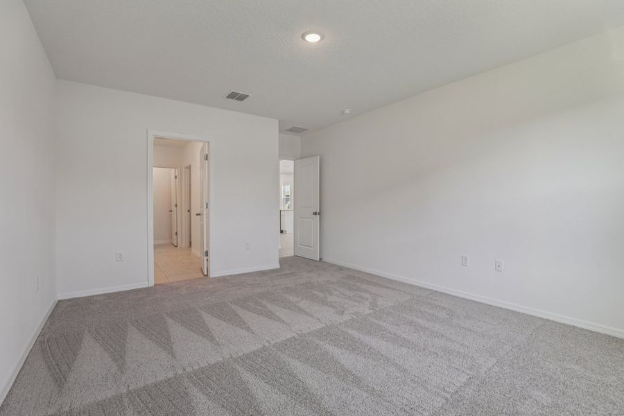 Representative unfurnished interior of a home built from the Vista by Maronda Homes in Heritage Station, Punta Gorda (Image 27).