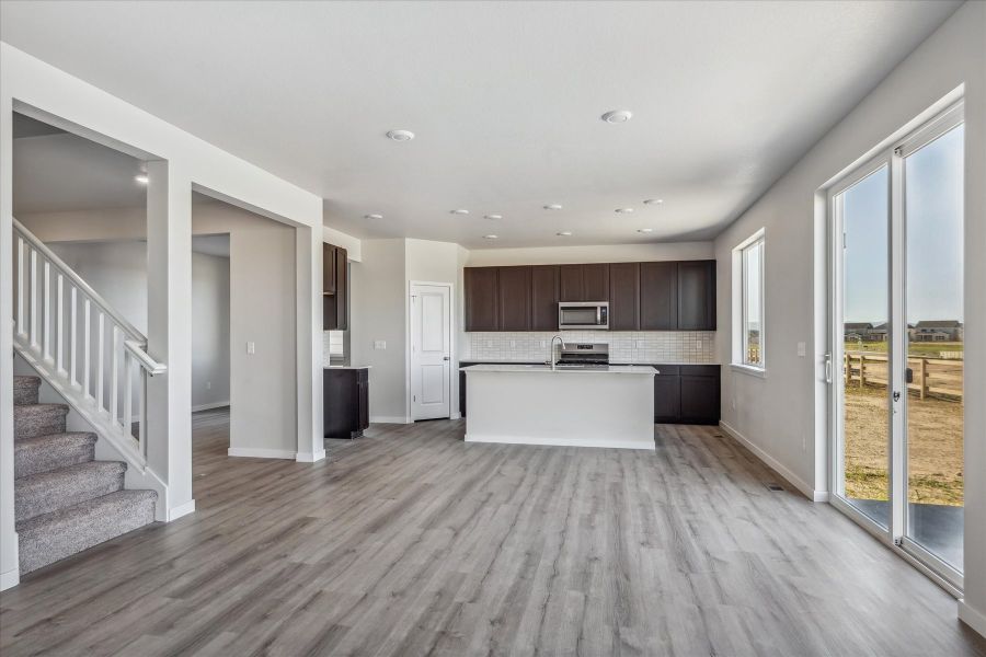 A large empty living room. A large empty living room.