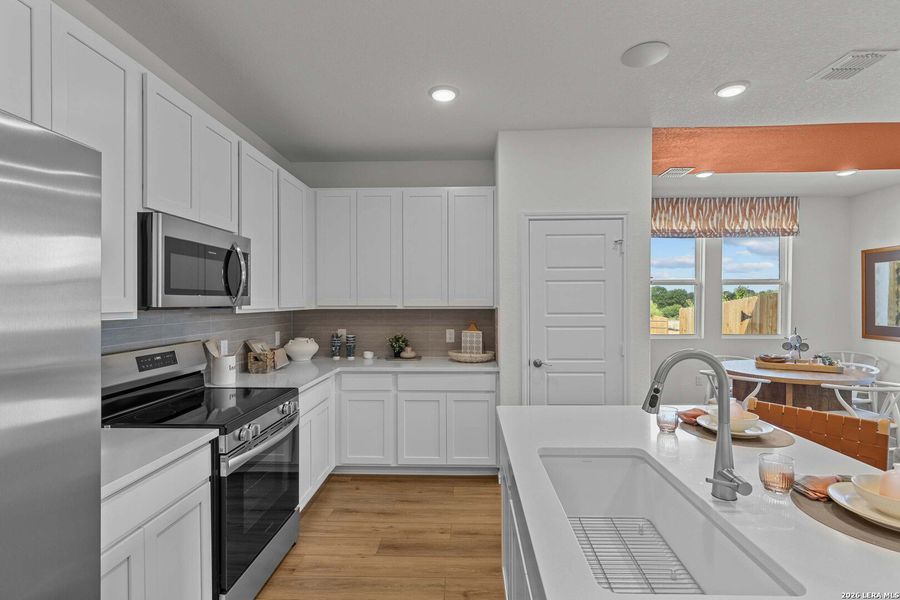 Furnished interior view inside a new home in Royal Crest, San Antonio (Image 39).