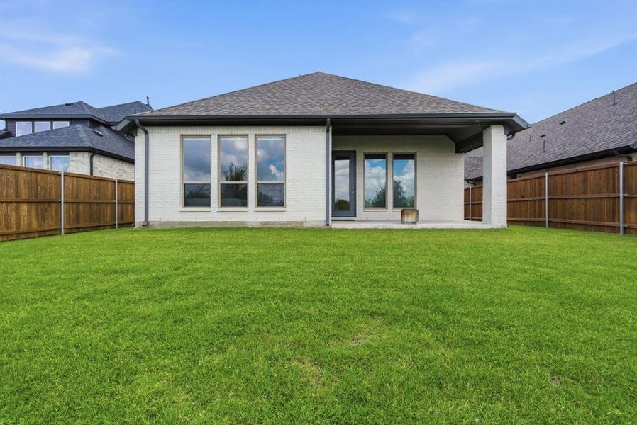 Exterior details and patio area of a home in Sweetgrass, Haslet (Image 22).