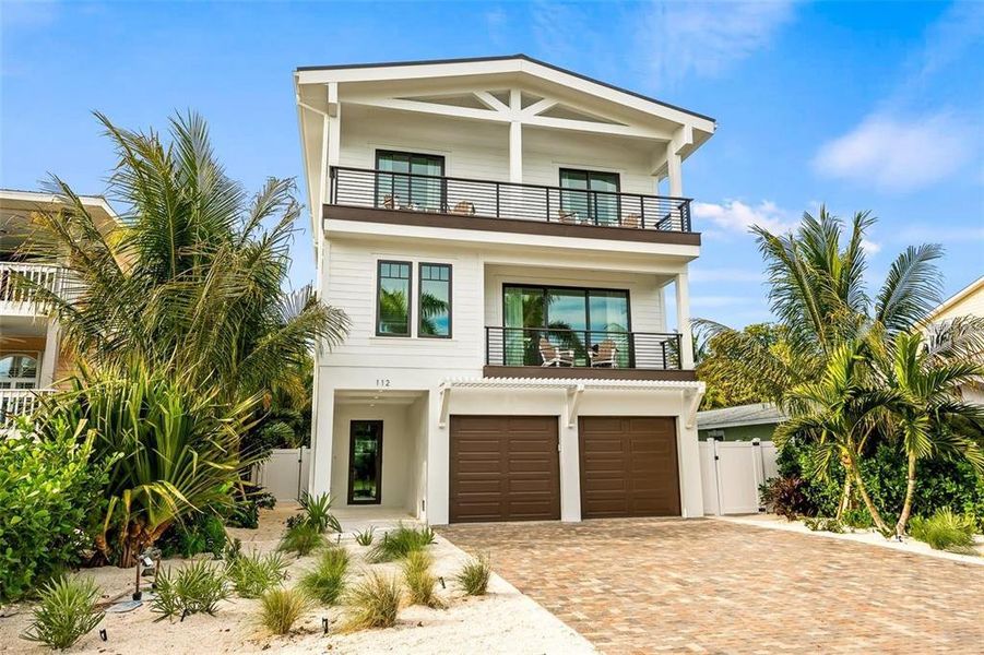 Front exterior of a new home in , Anna Maria, FL, highlighting curb appeal (Image 18).