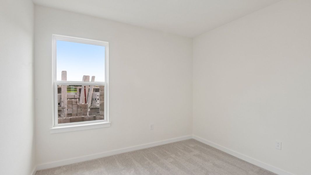 Furnished interior view inside a new home in Grasslands West, Lakeland (Image 27).
