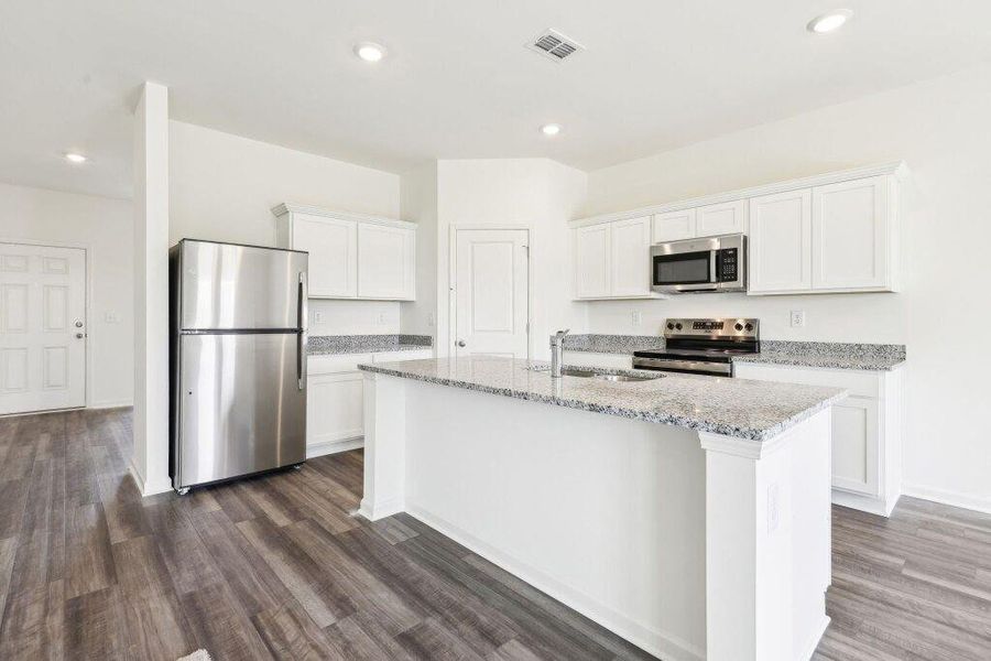 Furnished interior view inside a new home in Sunterra Lakes, Brookshire (Image 10).