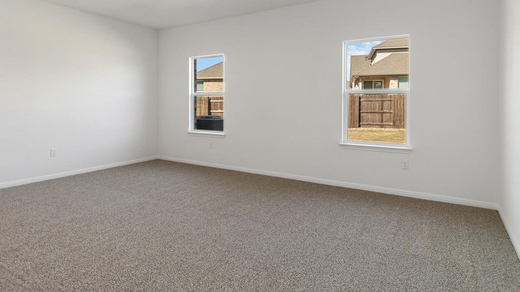 Spacious, unfurnished interior of a new home in Bar W Ranch, Leander (Image 12).