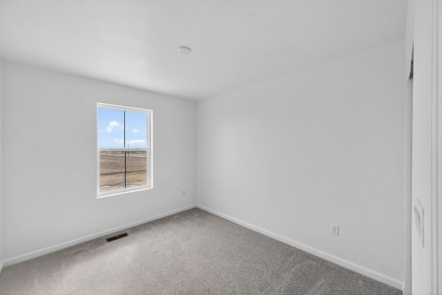 Spacious, unfurnished interior of a new home in Trailstone, Arvada (Image 14).