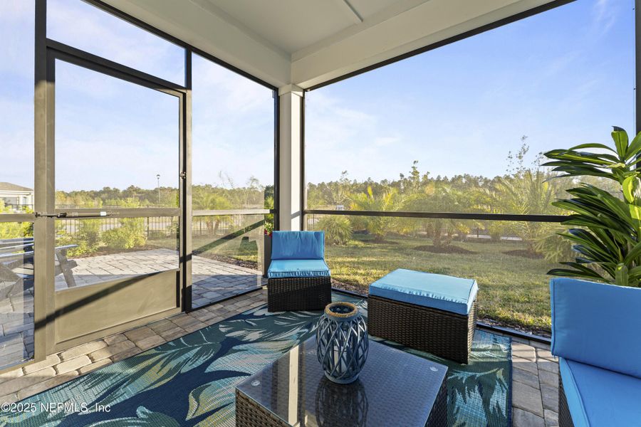 Exterior details and patio area of a home in Summer Bay at Grand Oaks, St. Augustine (Image 29).