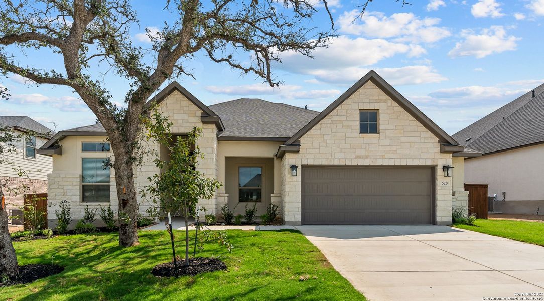 Front exterior of a new home in Mesa Western, Cibolo, TX, highlighting curb appeal (Image 21).