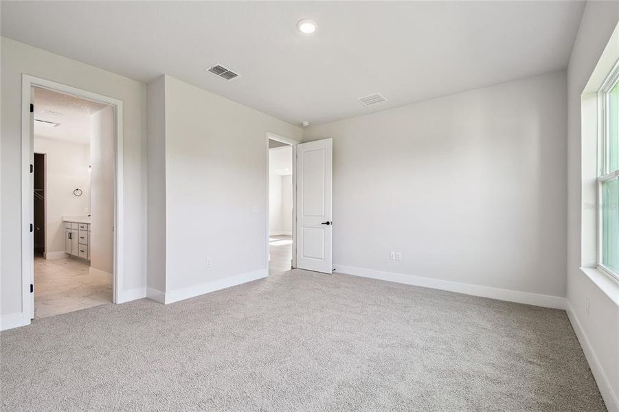 Spacious, unfurnished interior of a new home in Waterset Tradition Series, Apollo Beach (Image 27).