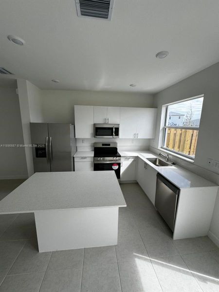 Furnished interior view inside a new home in , Homestead (Image 4).