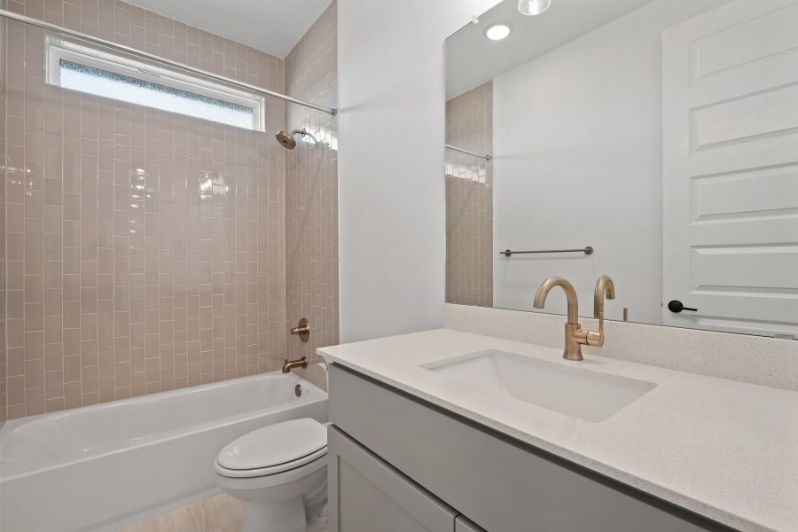 Furnished interior view inside a new home in Wolf Ranch, Georgetown (Image 19).
