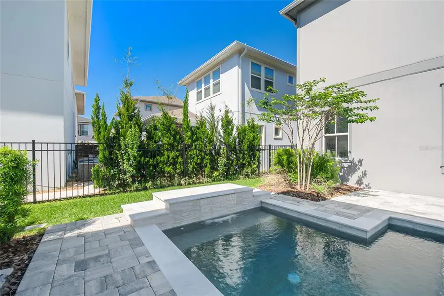 Exterior details and patio area of a home in , Orlando (Image 2).