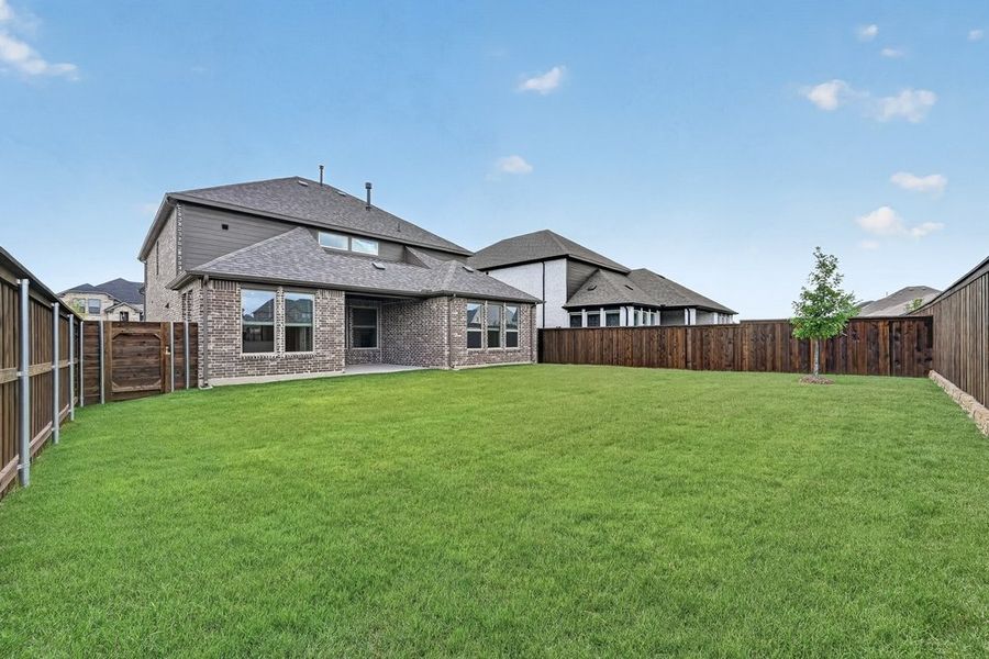 Exterior details and patio area of a home in The Ridge at Northlake, Northlake (Image 3).