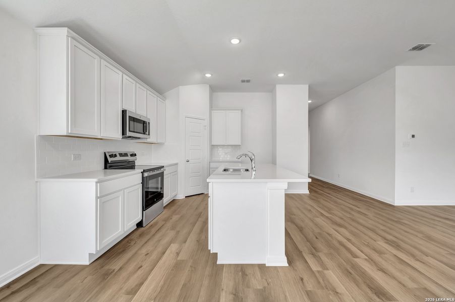 Furnished interior view inside a new home in Greenspoint Heights, Seguin (Image 8).