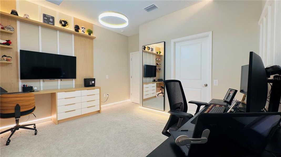 Furnished interior view inside a new home in Harvest at Ovation, Winter Garden (Image 41).