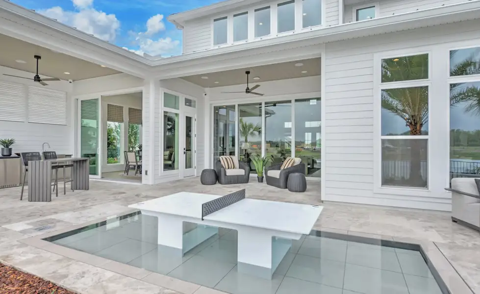 Exterior details and patio area of a home in EverRange, Jacksonville (Image 4).
