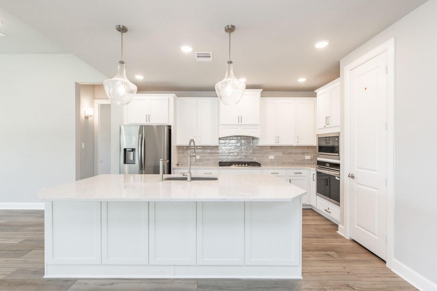 Furnished interior view inside a new home in Dunham Pointe - Enclave Collection, Cypress (Image 16).