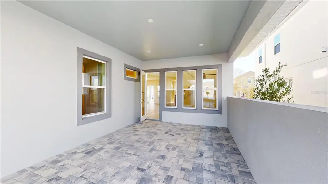 Exterior details and patio area of a home in Laureate Park, Orlando (Image 3).