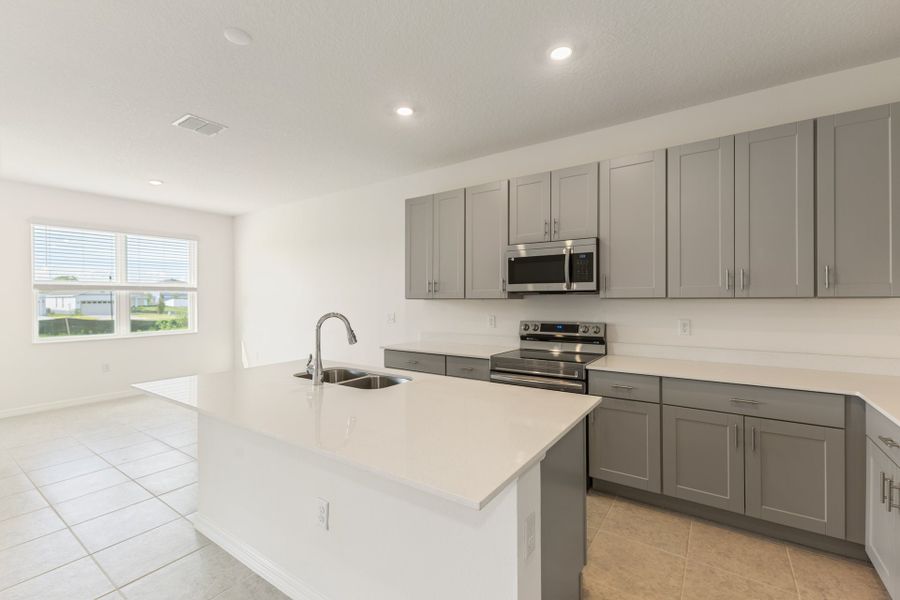 Furnished interior view inside a new home in Cypress Park Estates, Haines City (Image 6).