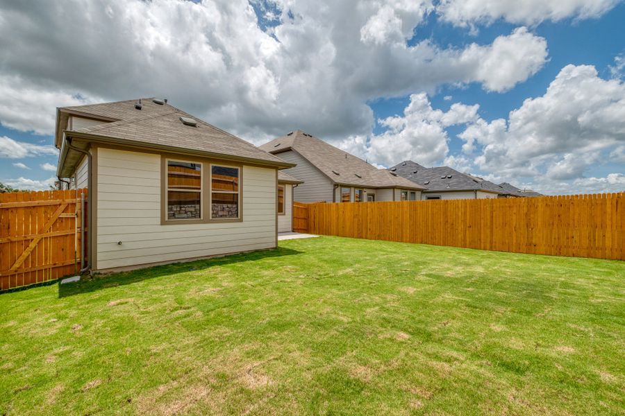 Exterior details and patio area of a home in Trinity Ranch, Elgin (Image 22).