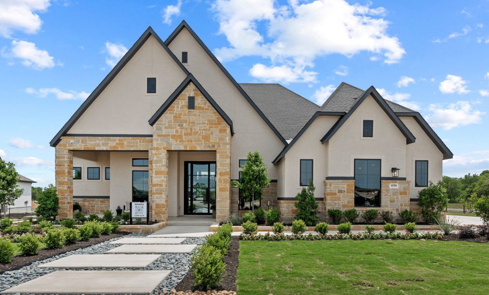 Representative exterior photo of a completed home built from the Savara by Chesmar Homes in Caliza Reserve, Boerne, TX (Image 4). Representative exterior photo of a completed home built from the Savara by Chesmar Homes in Caliza Reserve, Boerne, TX (Image 4).