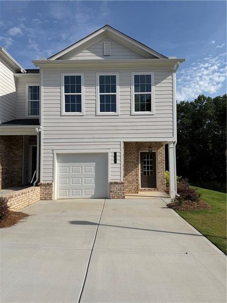 Front exterior of a new home in , Homer, GA, highlighting curb appeal (Image 1). Front exterior of a new home in , Homer, GA, highlighting curb appeal (Image 1).