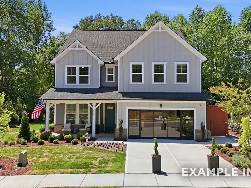 Front exterior of a new home in Rockport, Wake Forest, NC, highlighting curb appeal (Image 27). Front exterior of a new home in Rockport, Wake Forest, NC, highlighting curb appeal (Image 27).