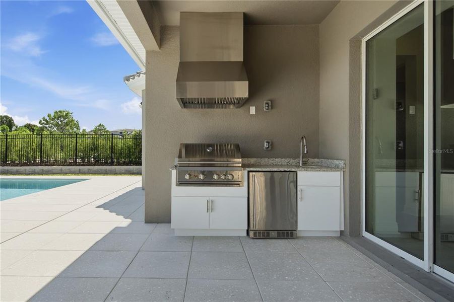 Exterior details and patio area of a home in Bella Collina, Montverde (Image 4).