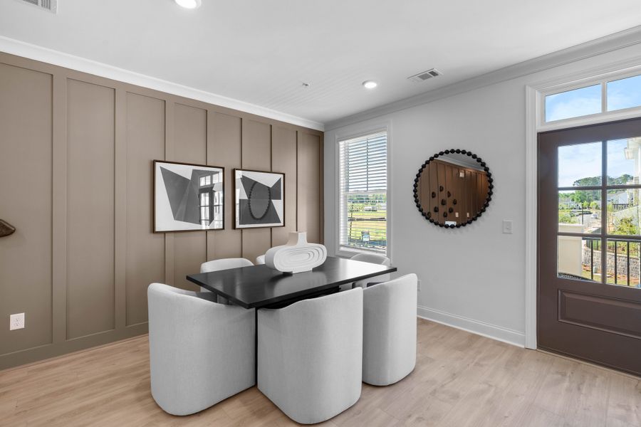 Representative furnished interior of a home built from the The Oleander by The Providence Group in Market Square at Sawnee Village, Cumming (Image 15).