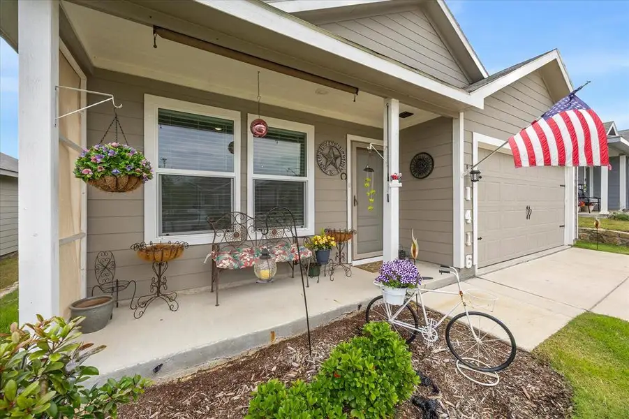 Exterior details and patio area of a home in Eastland, Crandall (Image 25).