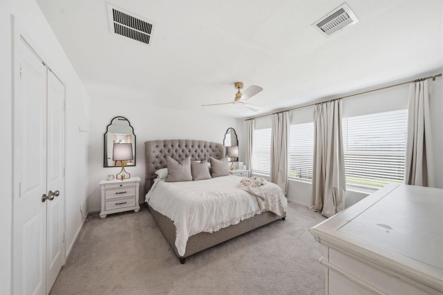 Primary bedroom with tons of natural light!
