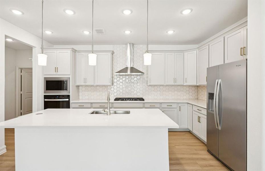 Island kitchen with pendant lighting