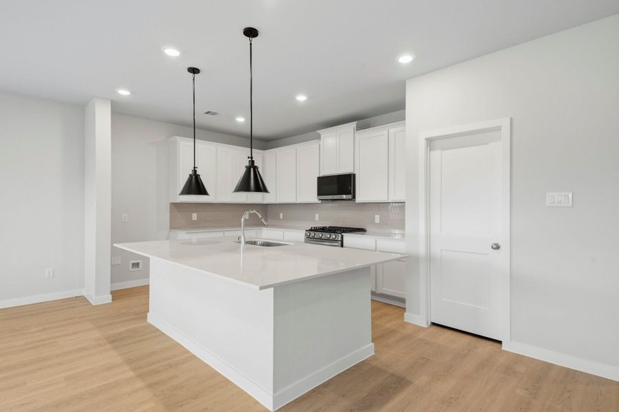 Furnished interior view inside a new home in Sunterra Lakes, Brookshire (Image 11).