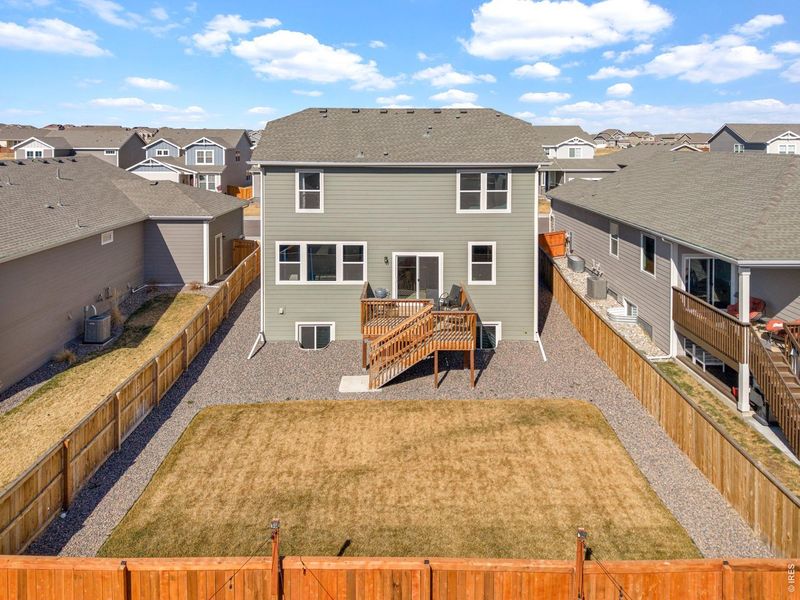 Exterior details and patio area of a home in Hidden Valley – Clover Collection, Severance (Image 25).