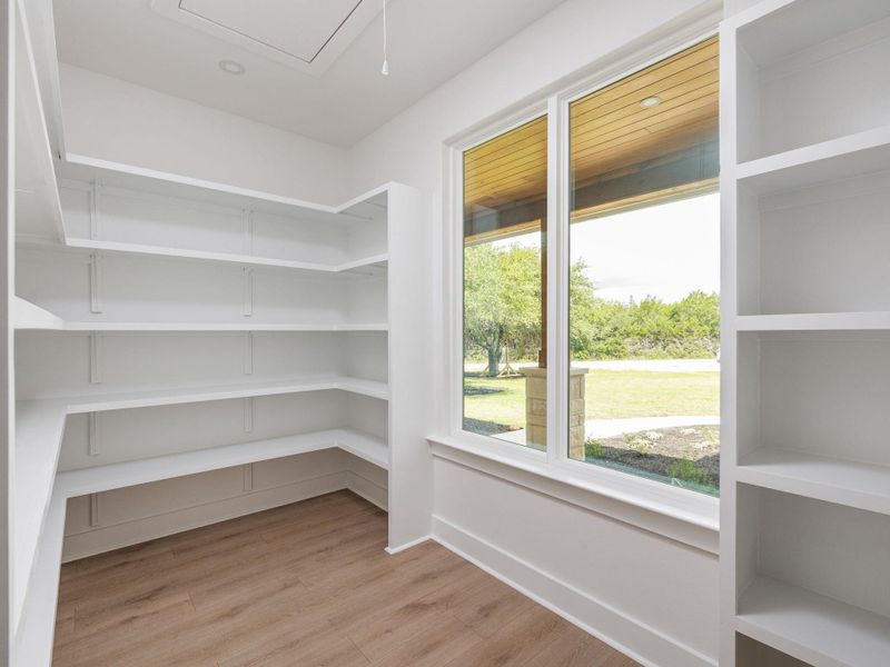 Huge walk in pantry with large window for natural lighting Huge walk in pantry with large window for natural lighting