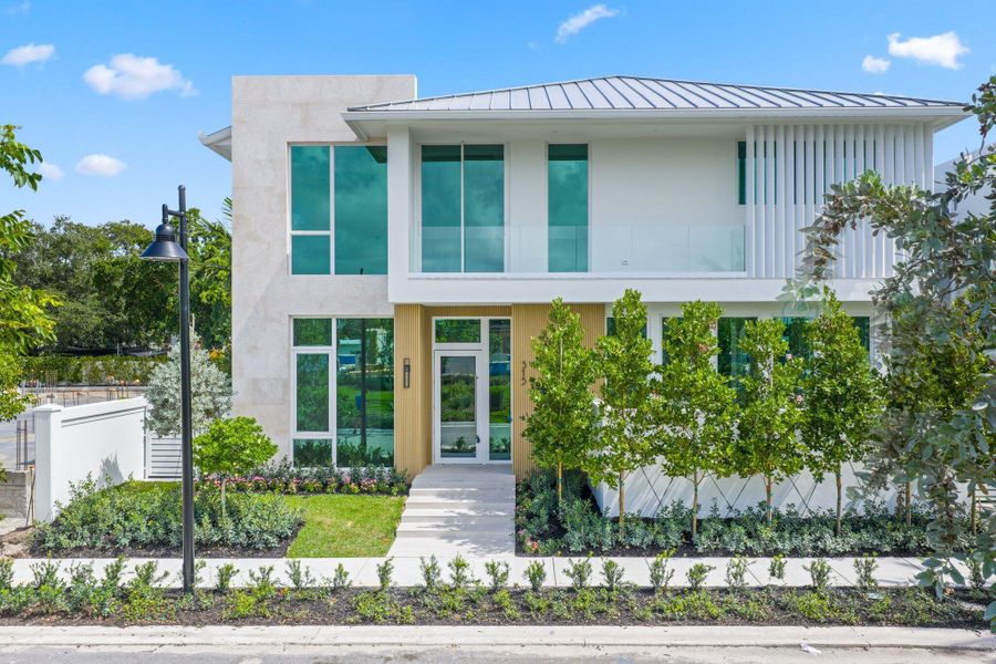 Front exterior of a new home in , Delray Beach, FL, highlighting curb appeal (Image 28). Front exterior of a new home in , Delray Beach, FL, highlighting curb appeal (Image 28).