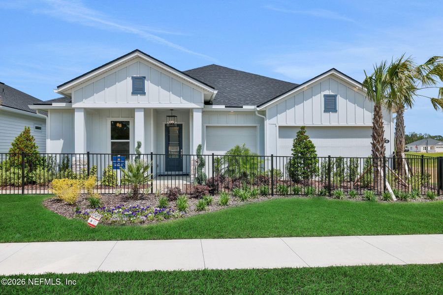 Front exterior of a new home in , Flagler Beach, FL, highlighting curb appeal (Image 25).