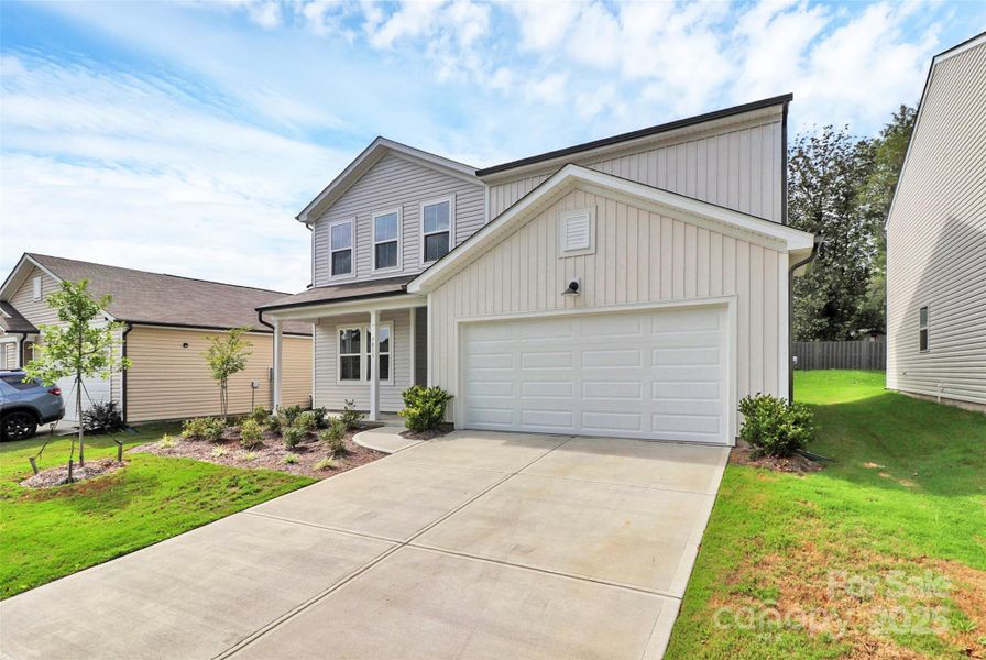 Front exterior of a new home in Sunbriar, Charlotte, NC, highlighting curb appeal (Image 16).