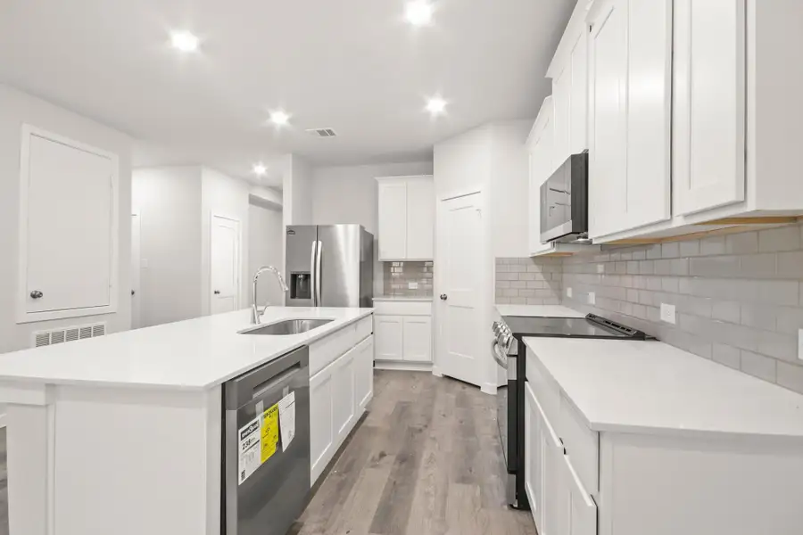 Furnished interior view inside a new home in Oakwood Ranch, Willis (Image 7).