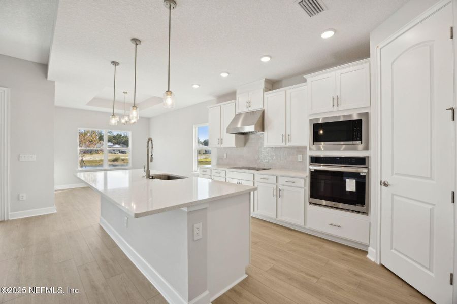 Furnished interior view inside a new home in Sandy Ridge, Yulee (Image 7).
