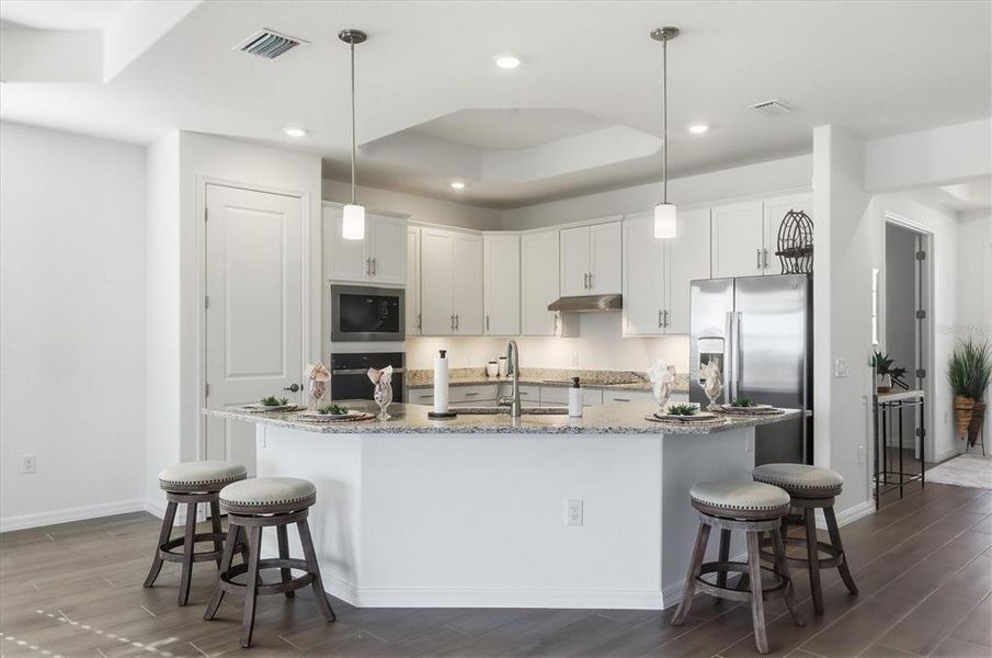 Furnished interior view inside a new home in Heritage Landing, Punta Gorda (Image 6).