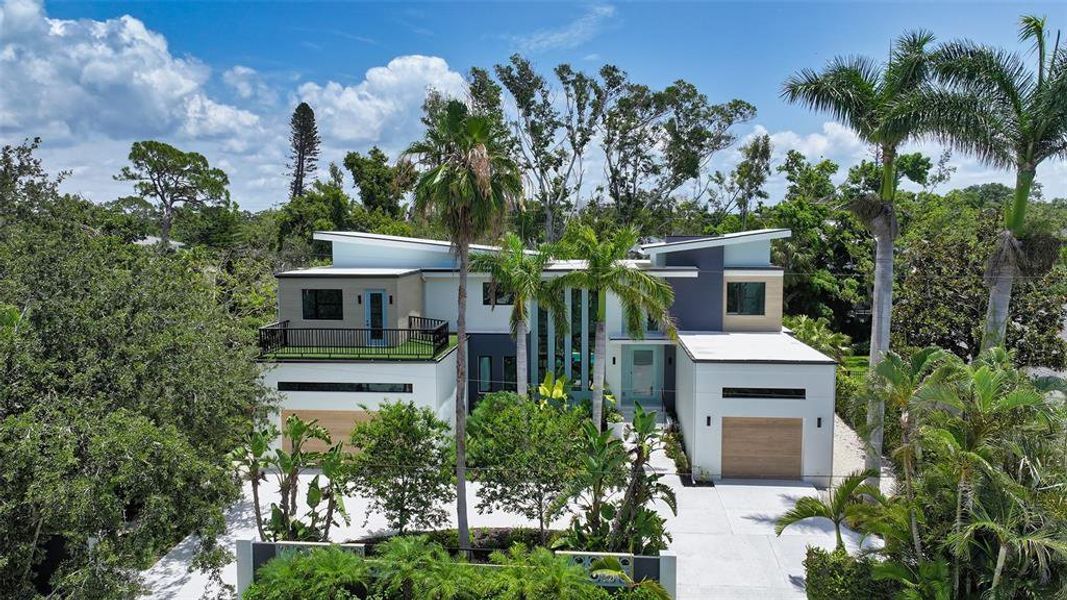 Front exterior of a new home in , Sarasota, FL, highlighting curb appeal (Image 27).