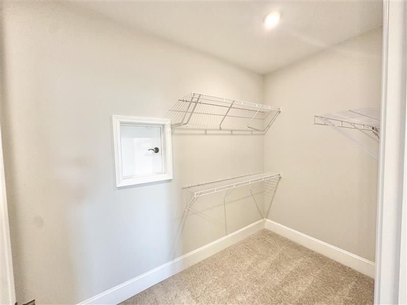 Spacious, unfurnished interior of a new home in Del Webb Wilmington at Mallory Creek, Leland (Image 19).