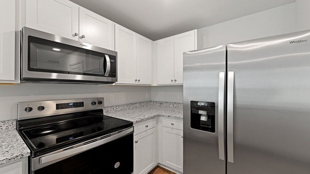 Furnished interior view inside a new home in Pine Hills at Cane Bay, Summerville (Image 6). Furnished interior view inside a new home in Pine Hills at Cane Bay, Summerville (Image 6).