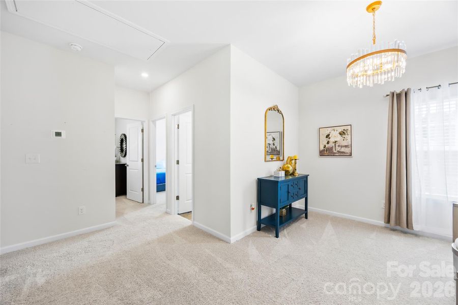 Furnished interior view inside a new home in Orchard Creek, Charlotte (Image 28).