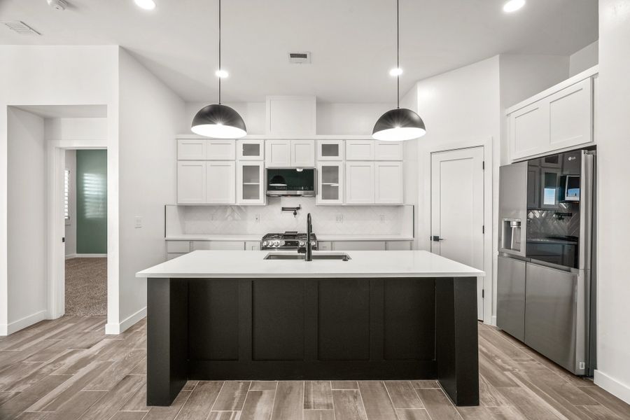 Furnished interior view inside a new home in Tierra Del Este 91, El Paso (Image 11). Furnished interior view inside a new home in Tierra Del Este 91, El Paso (Image 11).