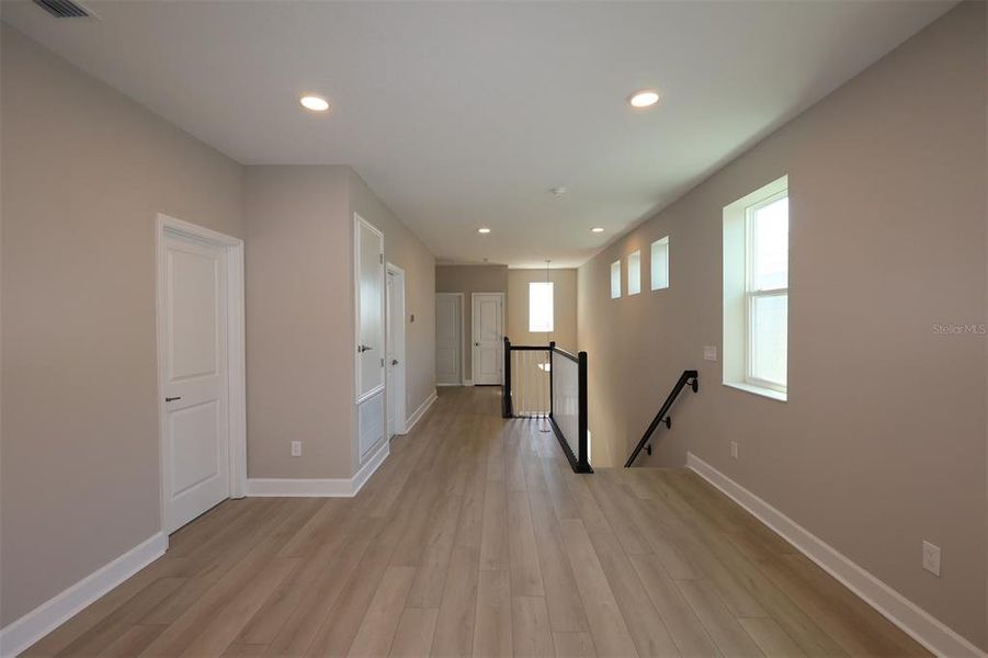 Spacious, unfurnished interior of a new home in Lake Star at Ovation, Winter Garden (Image 23).