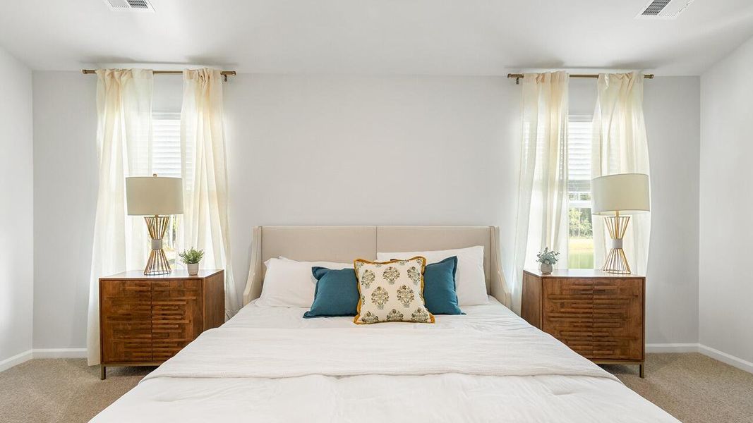 Furnished interior view inside a new home in Pine Hills Townhomes at Cane Bay, Summerville (Image 18).