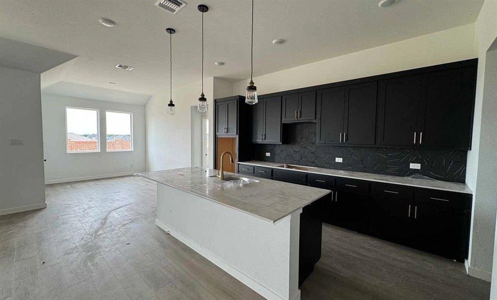 Open Kitchen-Dining Room Construction Progress featuring the Noir Collection