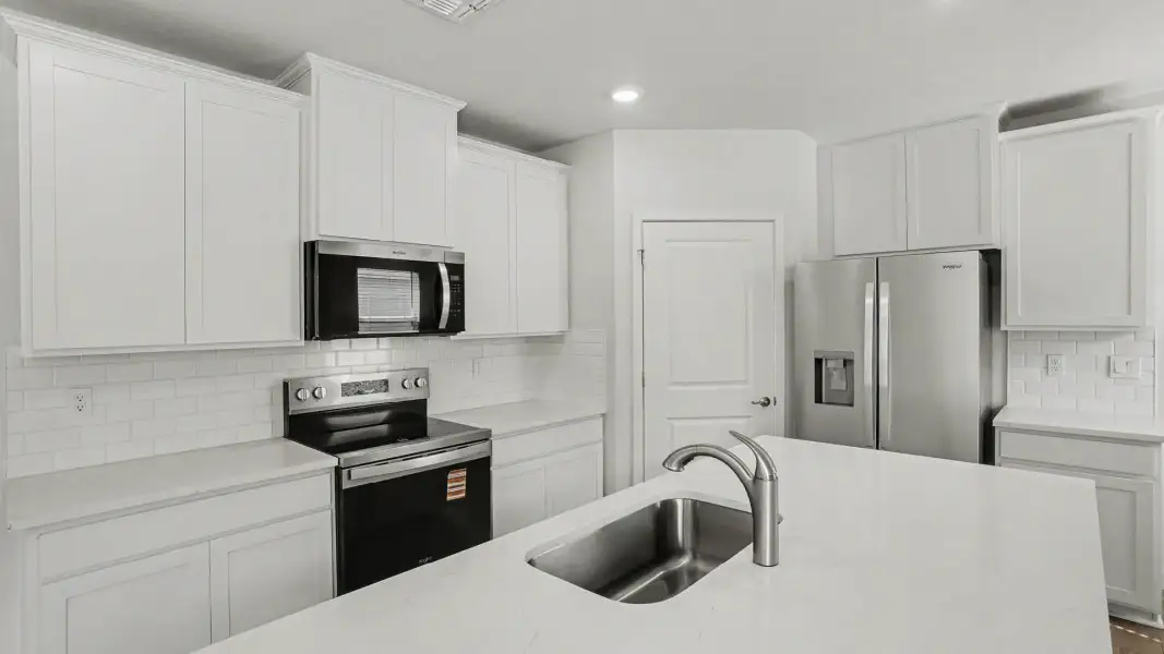Furnished interior view inside a new home in Venetian Grove, Vero Beach (Image 6).