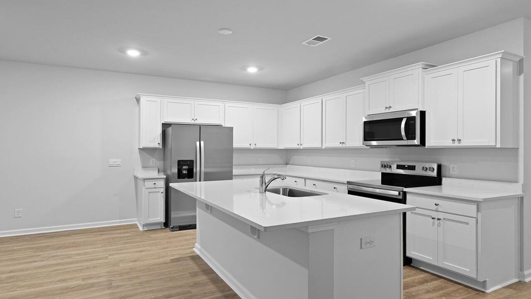 Furnished interior view inside a new home in Garbon Fields, Summerville (Image 7).